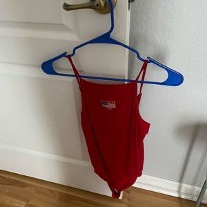 red bodysuit with american flag